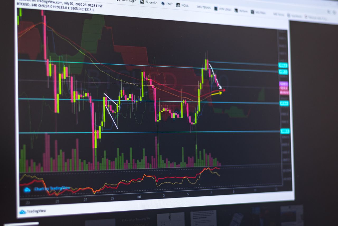 home-services-01 Close-up of a computer screen displaying cryptocurrency market trends and trading data.